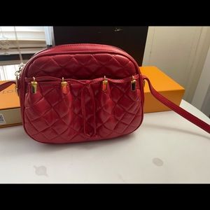 100% Authentic Judith Leiber lamb skin bag